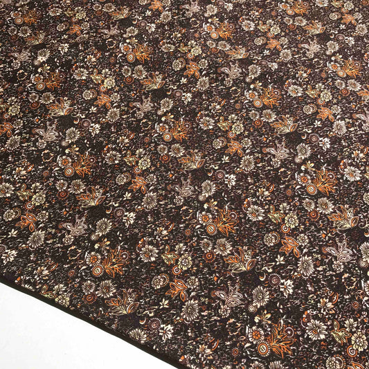 Mönstrat modetyg blommigt mönster i brun
