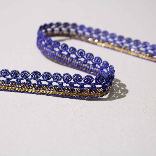 Dekorband lila och guld med spiralrosetter och genombruten struktur, 1,2 cm