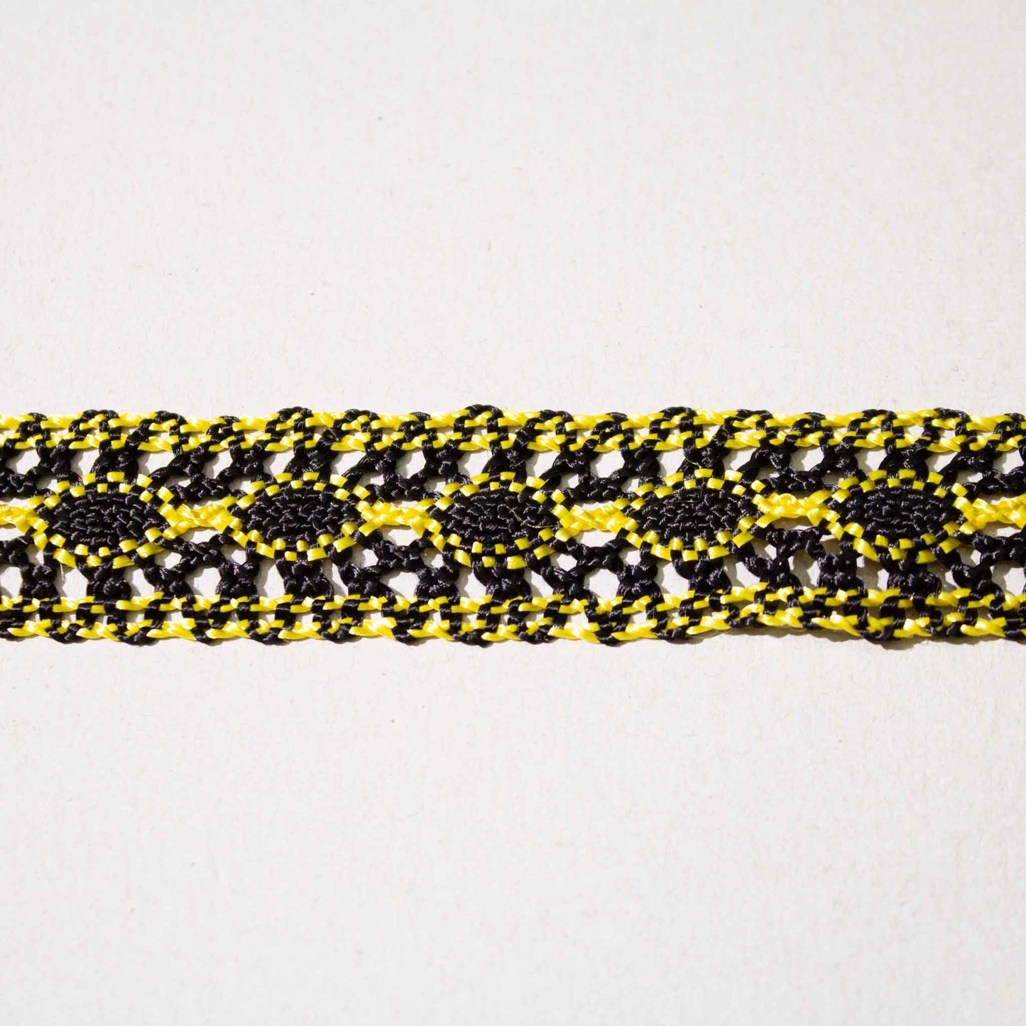 Band - Tygband Gul Svart 2,5cm 68