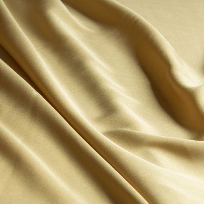 Grönt crepetyg 110 cm bredd 100 % polyester mjukt och följsamt tyg