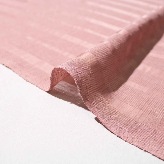Mönstrat tyg randigt rosa och gammelrosa 110 cm brett 100 % polyester följsamt och lättsytt